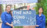 Tình nguyện viên Thủ đô sẵn sàng ô che, áo mưa đón thí sinh