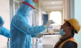 Lấy mẫu xét nghiệm COVID-19 tại TPHCM (ảnh: HCDC)