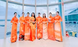 NTK Vũ Thảo Giang mang áo dài Việt 'tô cam' bầu trời quốc tế 