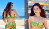 Hoa hậu Khánh Vân tạm biệt Miss Universe bằng bộ ảnh rực rỡ bên bờ biển, khoe eo siêu nhỏ