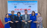 Ký kết hợp tác hướng nghiệp, giới thiệu việc làm cho thanh niên Lạng Sơn -Ảnh: Duy Chiến 