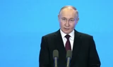 Tổng thống Nga Vladimir Putin bài phát biểu tại Triển lãm Nga-Trung lần thứ 8 và Diễn đàn Nga-Trung về hợp tác liên vùng lần thứ 4 tại Cáp Nhĩ Tân, Trung Quốc, ngày 17/5. (Ảnh: Sputnik)