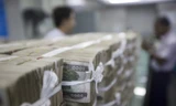 Đồng kyat của Myanmar đang giảm xuống mức kỷ lục so với đô la Mỹ. (Ảnh: Reuters)