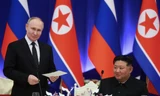 Tổng thống Nga Vladimir Putin và Chủ tịch Triều Tiên Kim Jong Un trong tiệc chiêu đãi ở Bình Nhưỡng vào tháng 6 năm nay. (Ảnh: Sputnik)