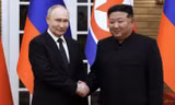 Tổng thống Nga Vladimir Putin và Chủ tịch Triều Tiên Kim Jong Un trong cuộc gặp ngày 19/6. (Ảnh: Reuters)