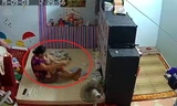 Nữ giúp việc đánh liên tục vào đầu và mông cháu bé vì không chịu uống sữa