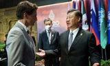 Chủ tịch Trung Quốc Tập Cận Bình và Thủ tướng Canada Justin Trudeau trong cuộc trao đổi ở Bali