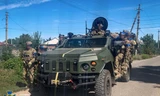 Xe của lực lượng an ninh Ukraine đi tuần ở Kupiansk, vùng Kharkiv, ngày 10/9