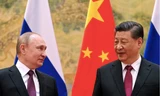 Tổng thống Nga Vladimir Putin và Chủ tịch Trung Quốc Tập Cận Bình trong cuộc gặp tại Bắc Kinh vào tháng 2. (Ảnh: NY Times)