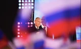 Tổng thống Nga Vladimir Putin dự một sự kiện chào mừng việc sáp nhập 4 tỉnh của Ukraine. (Ảnh: Reuters)