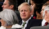 Thủ tướng Anh Boris Johnson và phu nhân dự sự kiện kỷ niệm 70 năm trị vị của Nữ hoàng Elizabeth ngày 4/6. (Ảnh: Reuters)