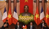 Chủ tịch nước Trần Đại Quang và Tổng thống Pháp Francois Hollande gặp gỡ báo chí. Ảnh: Như Ý.
