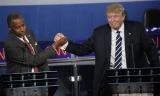 Ông Ben Carson (trái) đã quyết định đứng về phía Donald Trump. Ảnh: NY Times.