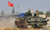 Quân đội Thổ Nhĩ Kỳ triển khai lực lượng trên đường biên giới với Syria. Ảnh: billyburtonblogs.