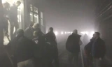 Nhà ga tàu điện ngầm Maalbeek mù mịt khói sau vụ nổ.