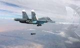 Máy bay ném bom Su-34 trong thời gian giáng đòn không kích tại các tỉnh Raqqa và Aleppo.