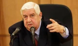 Ngoại trưởng Syria Walid Muallem phát biểu họp báo ở thủ đô Damascus hôm 12/3. Ảnh: AFP/TTXVN.