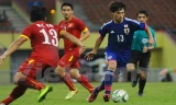 Các cầu thủ U23 Việt Nam (áo đỏ) thua U23 Nhật Bản.