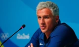 Ryan Lochte mô tả đã bị cướp dí súng vào đầu. Ảnh: Getty Images.