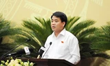 Chủ tịch UBND TP Hà Nội, Nguyễn Đức Chung phát biểu tại phiên chất vấn.