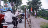 Hà Nội xén vỉa hè, dải phân cách đường Láng dịp sát Tết