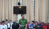 Phó Giám đốc CATP Hà Nội Đinh Văn Toản báo cáo tại hội nghị sáng 9/7