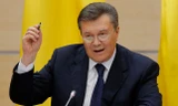 Ông Viktor Yanukovych, người hiện đang bị Ukraine truy nã quốc tế vì các cáo buộc giết người hàng loạt