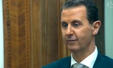 Tổng thống Syria Bashar al-Assad trong buổi phỏng vấn với AFP.