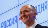 Cựu cố vấn của Tổng thống Mỹ Donald Trump, Carter Page, giao lưu với khán giả tại buổi diễn thuyết ở Moscow, Nga, ngày 12/12/2016. Ảnh: Reuters