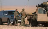 Lính Mỹ xuất hiện ở gần thành phố Raqqa, Syria. Ảnh: Reuters