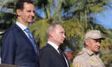 Tổng thống Nga Putin gặp người đồng cấp Syria Bashar al-Assad tại căn cứ không quân Khmeimim. Ảnh: Sputnik