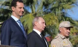 Tổng thống Nga Putin gặp người đồng cấp Syria Bashar al-Assad tại căn cứ không quân Khmeimim. Ảnh: Sputnik
