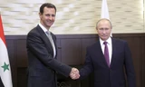 Tổng thống Nga Vladimir Putin gặp người đồng cấp Syria Bashar Assad tại Sochi hôm 20/11. Ảnh: Reuters