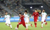 Một pha lên bóng của đội Việt Nam trong trận gặp Iraq