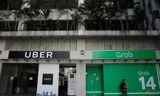 Một góc văn phòng của Uber và Grab chụp vào ngày 26/3/2018. Ảnh: Reuters