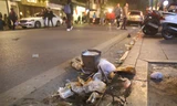 Sau màn pháo hoa năm mới, đường phố Hà Nội lại ngập rác