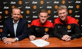 Rooney đã đặt bút ký hợp đồng mới với M.U.