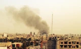 Khói bốc lên từ hiện trường vụ đánh bom.