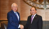 Thủ tướng Nguyễn Xuân Phúc và Thủ tướng Malaysia Najib Razak. Ảnh: VGP/Quang Hiếu.