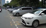 Bãi đỗ ôtô ở trung tâm Sài Gòn vắng khách trong ngày thu phí kiểu mới