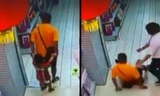 Khoảnh khắc người bố ngã đè lên con trai được ghi lại bởi camera giám sát.