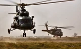 Trực thăng Mi-17 (trái) của không quân Iraq. Ảnh: Quân đội Mỹ