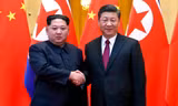 Chủ tịch Triều Tiên Kim Jong-un (trái) và Chủ tịch Trung Quốc Tập Cận Bình (phải). Ảnh: Reuters