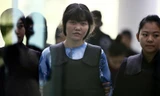 Đoàn Thị Hương xuất hiện tại tòa. Ảnh: AP