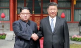 Chủ tịch Trung Quốc Tập Cận Bình và Chủ tịch Triều Tiên Kim Jong-un gặp nhau tại Trung Quốc. Ảnh: Reuters