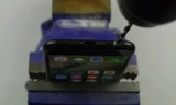 Hướng dẫn cách tạo lỗ cắm tai nghe trên iPhone 7 bằng... khoan