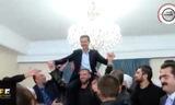 Ăn mừng giải phóng, cư dân Syria nâng Tổng thống Assad trên vai
