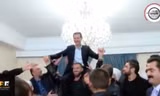 Ăn mừng giải phóng, cư dân Syria nâng Tổng thống Assad trên vai