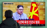 Một người ở Hàn Quốc xem bản tin về bài phát biểu năm mới của Kim Jong-un. Ảnh: AFP.
