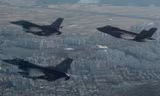 Chiến đấu cơ F-35A của Mỹ bay diễn tập cùng chiến đấu cơ F-16 tại Hàn QUốc hôm 1/12. Ảnh: Reuters